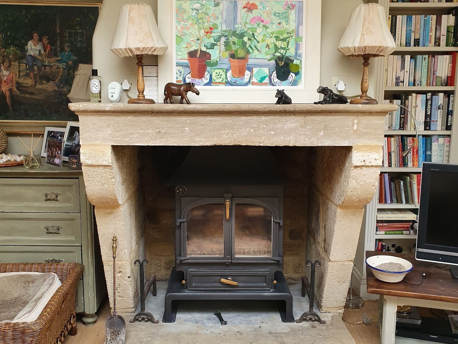 A Clearview 650 in a stone fireplace in a sitting room
